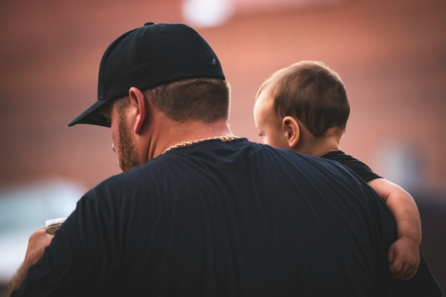 a man holding a baby